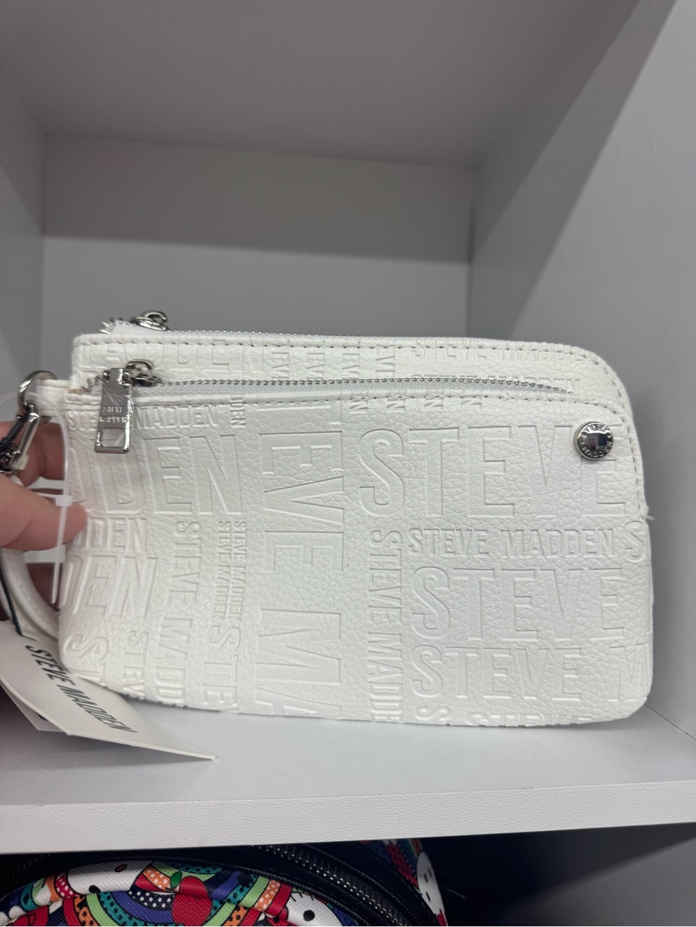 Steve Madden White Embossed Logo Wristlet Clutch